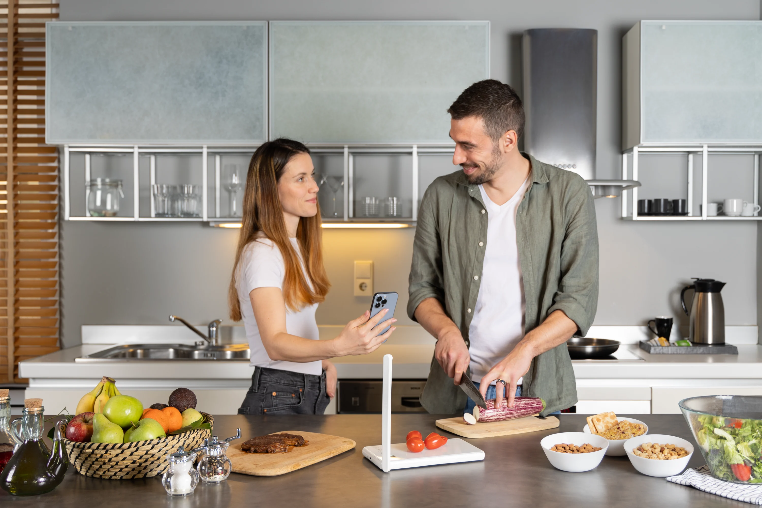 two persons in the kitchen using qalzy